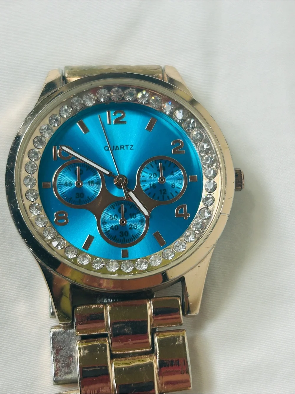 Women's Blue Crystal Accent Quartz Watch with Gold-Tone Bracelet